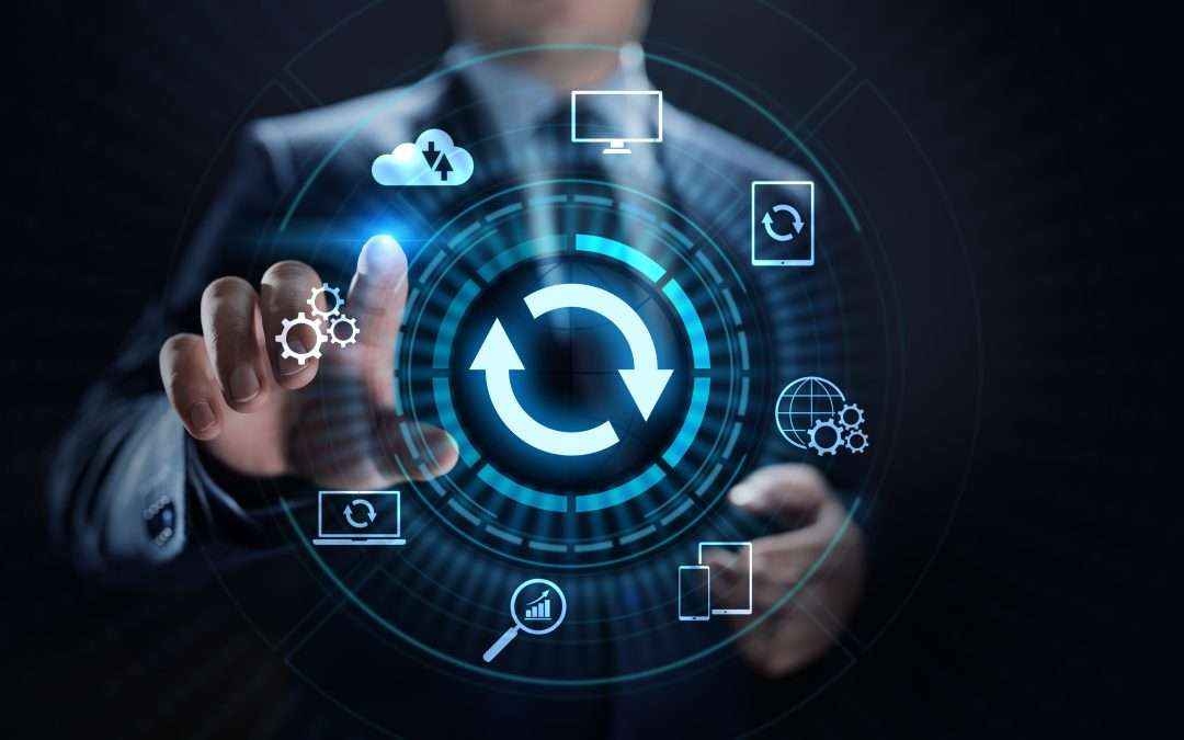 Business user interacting with a blue software update symbol and connected devices